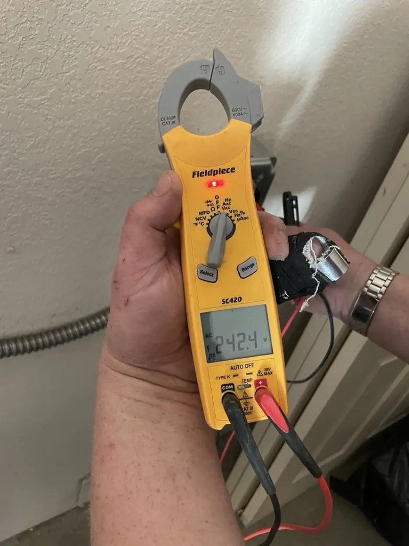 Voltage testing with clamp meter during Aluminum Wiring Replacement in Belton